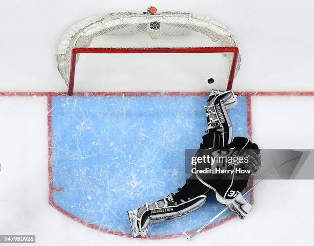 Jonathan Quick of the Los Angeles Kings allows a goal to Brayden McNabb of the Vegas Golden Knights for a 1-0 lead during the second period in Game...