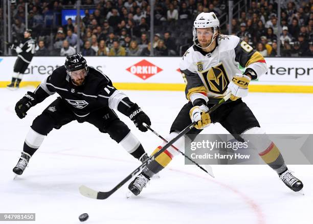 Colin Miller of the Vegas Golden Knights clears the puck away from Torrey Mitchell of the Los Angeles Kings during the second period in Game Four of...