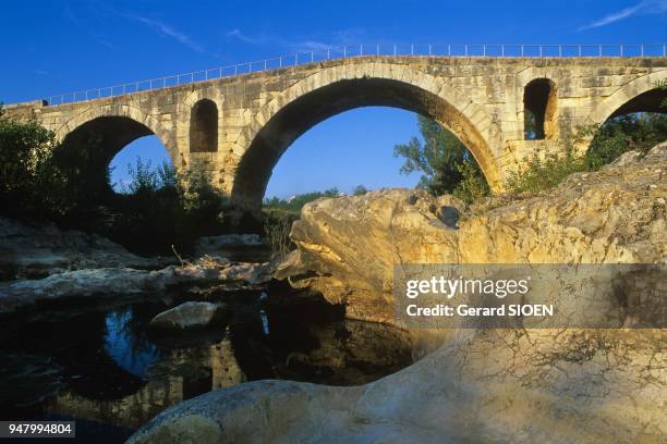 The Julien bridge over the Calavon near Bonnieux in the regional natural park of Luberon, Provence, France.