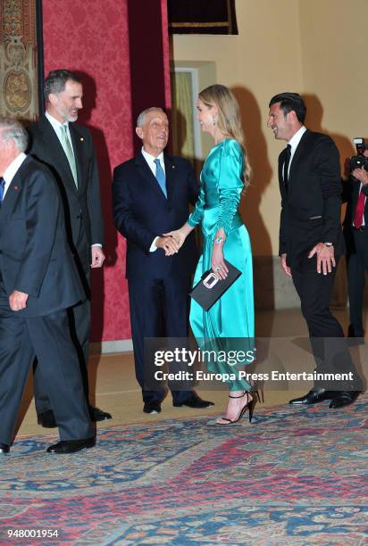 Luis Figo and Helen Svedin attend the reception offered by Portugal president Marcelo Rebelo de Sousa to King Felipe of Spain and Queen Letizia of...