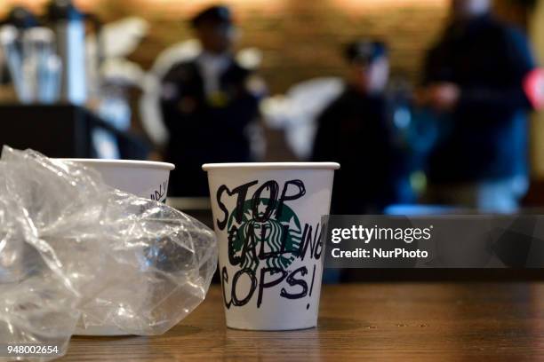 Protesters gather on April 16, 2018 for ongoing protest at the Starbucks location in Center City Philadelphia, PA where days earlier two black men...