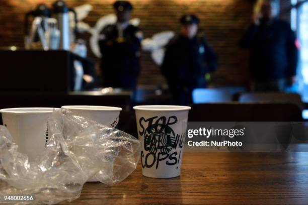 Protesters gather on April 16, 2018 for ongoing protest at the Starbucks location in Center City Philadelphia, PA where days earlier two black men...