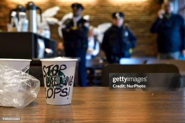 Protesters gather on April 16, 2018 for ongoing protest at the Starbucks location in Center City Philadelphia, PA where days earlier two black men...