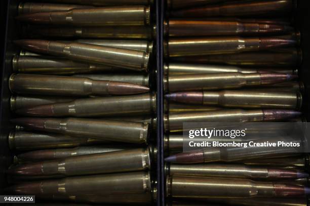 rounds of .50 caliber ammunition - ammunition stock pictures, royalty-free photos & images