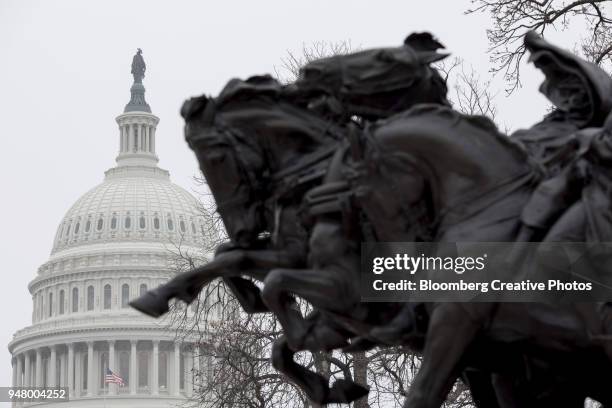 the u.s. capitol is seen behind the ulysses s. grant memorial - ulysses s grant statue stock pictures, royalty-free photos & images