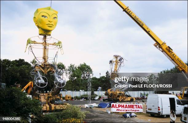 Each measuring 65 ft. Tall, weighing approximately 40 tons and powered by diesel engines. The giant human figures were constructed to represent the...