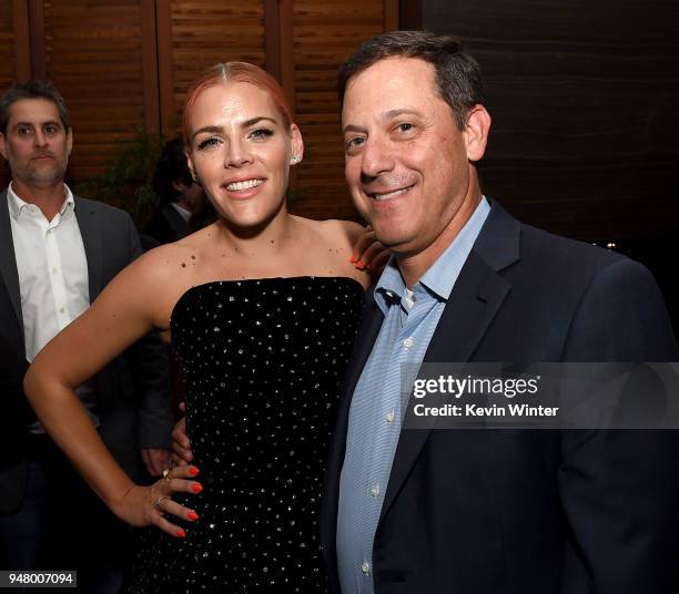 Actress Busy Philipps and Adam Fogelson, Chairman, STX Films pose at the after party for the premiere of STX Films' "I feel Pretty" at Baltaire...