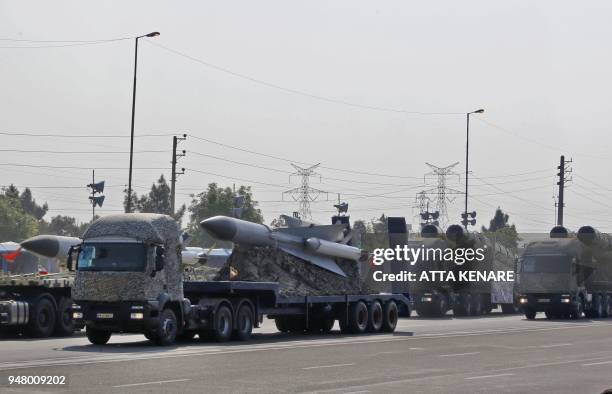 An Iranian military truck carries part of surface-to-air missiles during a parade on the occasion of the country's annual army day on April 18 in...