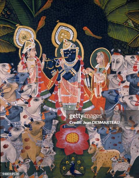 Painting on canvas representing a famous mythological scene linked to KRISHNA, an avatar of the Hindu god VISHNU. KRISHNA plays the flute among...