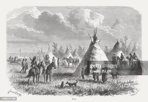 camp of the sioux, wood engraving, published in 1868 - sioux native american tribe stock illustrations