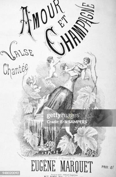 Cover of a brochure containing the lyrics and score of the song AMOUR ET CHAMPAGNE, written by Eugene MARQUET. On the engraving, angels holding a...