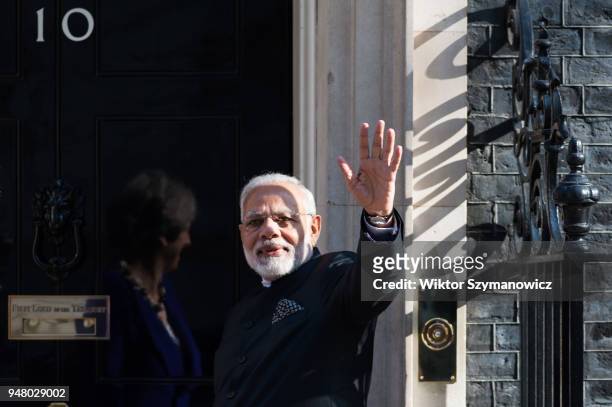 Prime Minister of India Narendra Modi poses outside 10 Downing Street in central London before meeting with British Prime Minister Theresa May. April...