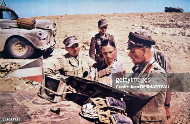 German Marshall Erwin ROMMEL, the commander of the Afrikakorps, giving directions to officers in Egypt or Libya during the battles he was undertaking...