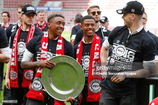Dante Rigo of PSV, Steven Bergwijn of PSV, Kenneth Paal of PSV, Marco van Ginkel of PSV Celebrate the championship during the PSV champions parade at...
