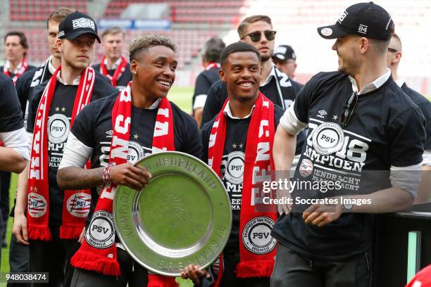 Dante Rigo of PSV, Steven Bergwijn of PSV, Kenneth Paal of PSV, Marco van Ginkel of PSV Celebrate the championship during the PSV champions parade at...