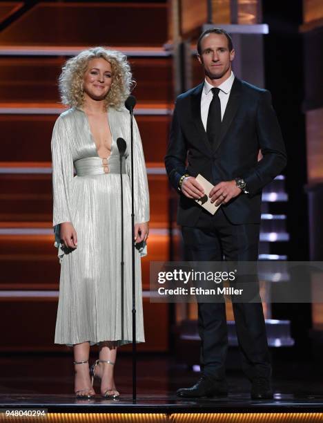 Singer/songwriter Cam and NFL player Drew Brees present an award during the 53rd Academy of Country Music Awards at MGM Grand Garden Arena on April...