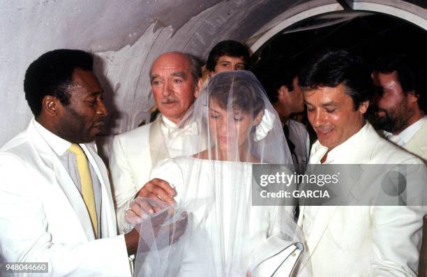 Eddie Barclay with his seventh wife Cathy Esposito with Alain Delon and Pele.