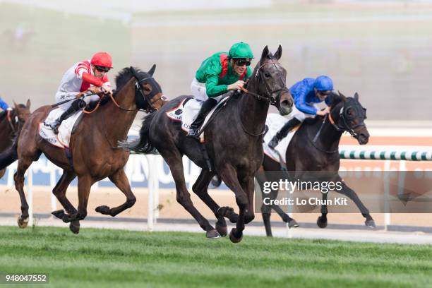 Christophe Soumillon riding Vazirabad wins the Dubai Gold Cup during the Dubai World Cup Day at Meydan Racecourse on March 31, 2018 in Dubai, United...