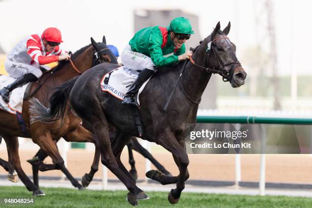 Christophe Soumillon riding Vazirabad wins the Dubai Gold Cup during the Dubai World Cup Day at Meydan Racecourse on March 31, 2018 in Dubai, United...