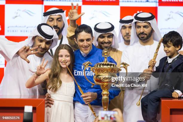 Christophe Soumillon and connections of Thunder Snow celebrate after winning the Dubai World Cup at Meydan Racecourse on March 31, 2018 in Dubai,...