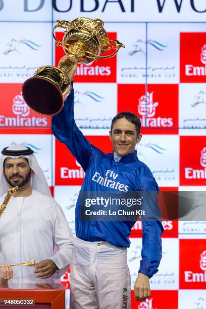 Christophe Soumillon celebrates after Thunder Snow winning the Dubai World Cup at Meydan Racecourse on March 31, 2018 in Dubai, United Arab Emirates.