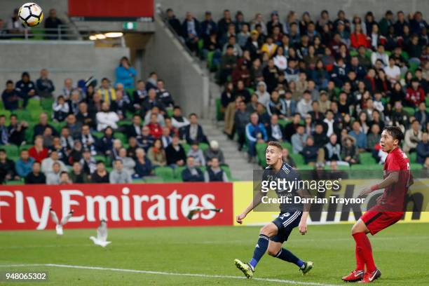 Jai Ingham of the Victory watches his header fly past the goal keeper during the AFC Champions League match between Melbourne Victory and Shanghai...