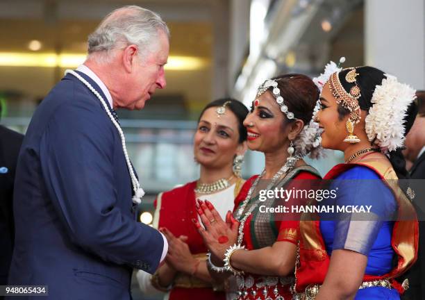 Britain's Prince Charles, Prince of Wales greets dancers during a visit with India's Prime Minister Narendra Modi to the Science Museum in London on...