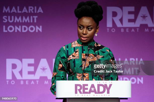 Nigerian writer Chimamanda Ngozi Adichie makes a speech at the Malaria Summit at 8 Northumberland Avenue on April 18, 2018 in London, England. The...