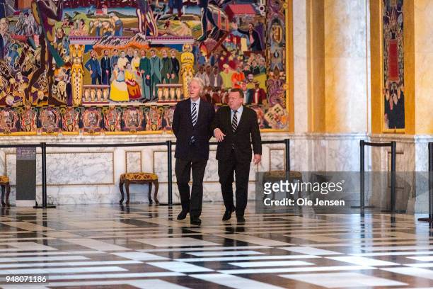 Former US president Bill Clinton meets Danish Prime Minister Lars Loekke Rasmussen and is shown around in the Knights Hall in the Parliament with...