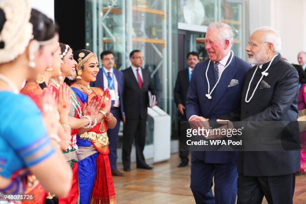 Prince Charles, Prince of Wales and Prime Minister of India Narendra Modi speak to dancers during their visit to the Science Museum on April 18, 2018...
