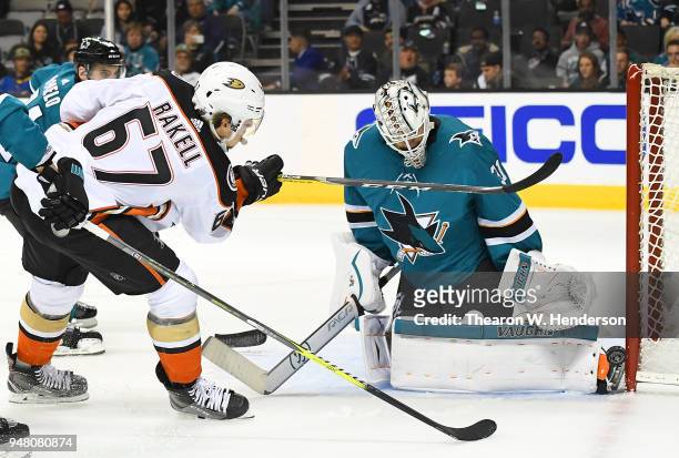 Goalie Martin Jones of the San Jose Sharks defends against Rickard Rakell of the Anaheim Ducks during the third period in Game Three of the Western...