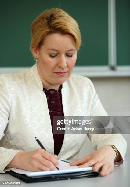Family Minister Franziska Giffey takes notes as she visits a training center for senior citizen care providers at the Evangelical Johannes Foundation...