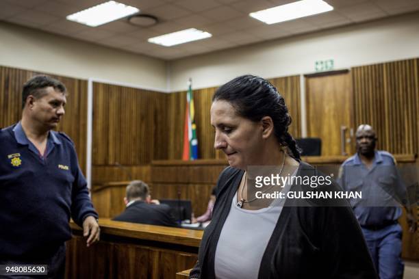 Former realtor Vicki Momberg reacts at the end of her appeal trial on April 18, 2018 at the Randburg Magistrate Court, in Johannesburg, where she...