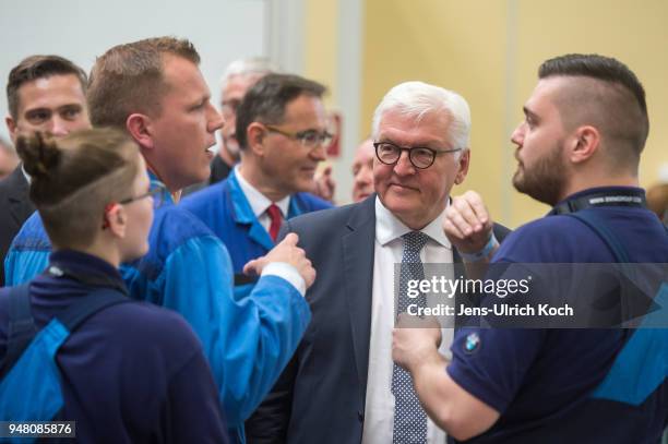 German President Frank-Walter Steinmeier talk to trainees and training teachers at BMW Group Plant Leipzig on April 18, 2018 in Leipzig, Germany....