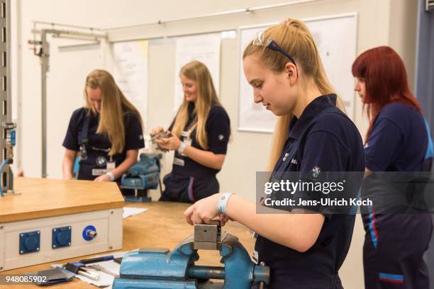 Female trainees tool workparts at a metal works training center at BMW Group Plant Leipzig on April 18, 2018 in Leipzig, Germany. Germany. Steinmeier...
