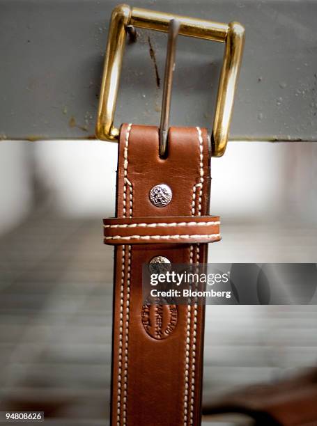 Belt hangs to dry during production at the D.M. Bullard Leather manufacturing shop in Azle, Texas, U.S., on Thursday, Dec. 2009. The U.S. Economic...