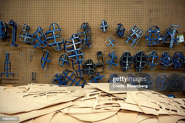 Leather scraps and gun holster cutouts sit on a table at the D.M. Bullard Leather manufacturing shop in Azle, Texas, U.S., on Thursday, Dec. 2009....