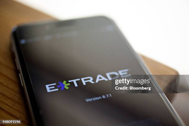 The E*Trade Financial Corp. Application is displayed on an Apple Inc. IPhone in Washington, D.C., U.S., on Wednesday, April 11, 2018. E*Trade is...