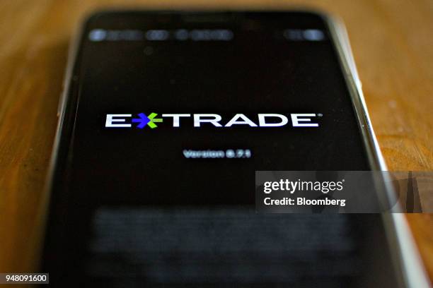 The E*Trade Financial Corp. Application is displayed on an Apple Inc. IPhone in Washington, D.C., U.S., on Wednesday, April 11, 2018. E*Trade is...