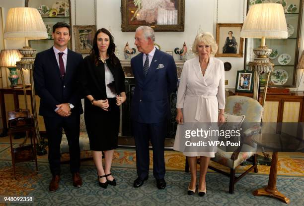 Clarke Gayford and his partner Prime Minister of New Zealand Jacinda Ardern pose with Prince Charles, Prince of Wales and Camilla Duchess of Cornwall...