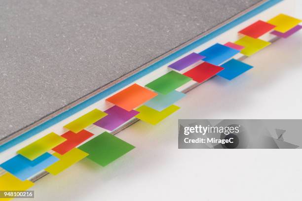 colorful adhesive bookmarks - bookmark stock pictures, royalty-free photos & images