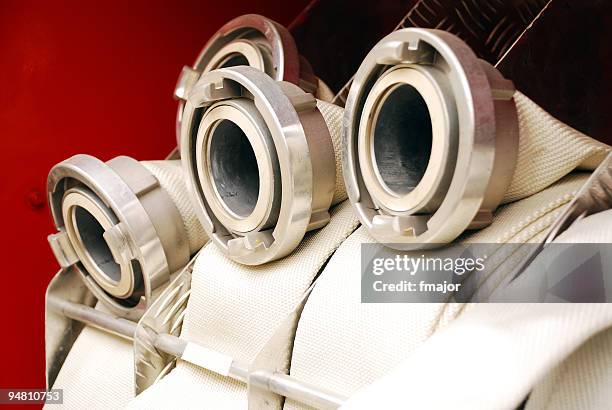 fire-hose - firehoses stock pictures, royalty-free photos & images