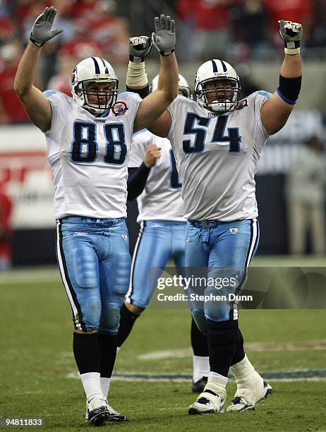 Special teams inemen Craig Stevens and Eugene Amano#54 of the Tennessee Titans celebrate as their game winning field goal clears the uprights with 47...