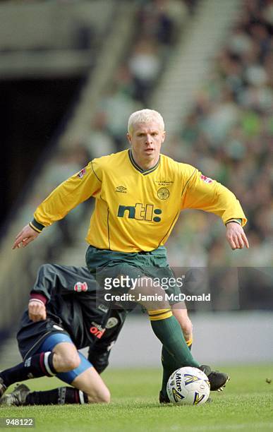 Neil Lennon of Celtic runs with the ball during the Scottish CIS Insurance Cup Final against Kilmarnock played at Hampden Park, in Glasgow, Scotland....