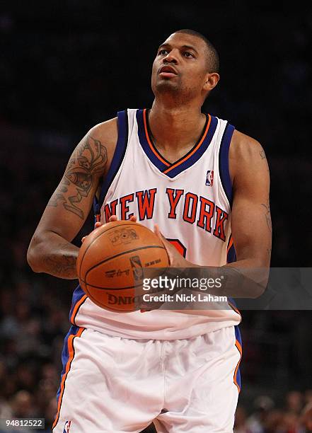 Jonathan Bender of the New York Knicks shoots a free throw against the Los Angeles Clippers at Madison Square Garden on December 18, 2009 in New York...