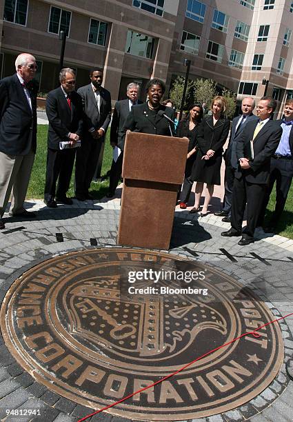 Representative Stephanie Tubbs Jones speaks with members of the Sound Banking Coalition at a news conference outside the FDIC headquarters in...