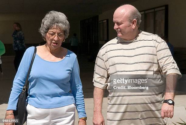 Beatrice Hinojosa and Louis Motal leave the Nueces County courthouse during a recess of a pre trial hearing on Monday, April 10 in Corpus Christi,...
