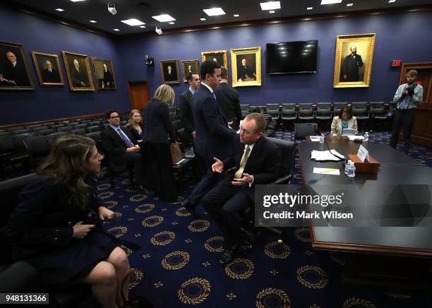 Office of Management and Budget Director Mick Mulvaney prepares to testify to a House Appropriations Committee, on Capitol Hill, April 18, 2018 in...