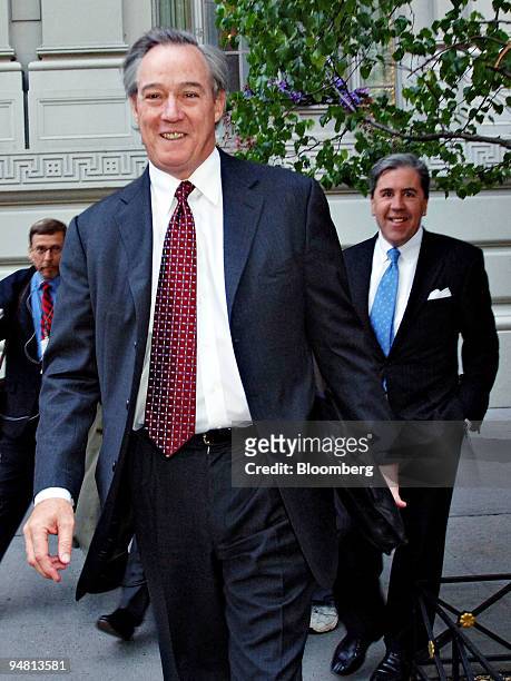 Philip Purcell, CEO of Morgan Stanley, leaves the Pierre Hotel in New York after delivering a speech to the UBS AG financial services conference...