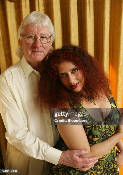 John Muliis, director of Opera, UK, left, and his wife Soprano Scheherazade Pesamte, pose in their living room, Thursday, April 7 in London, U.K. The...